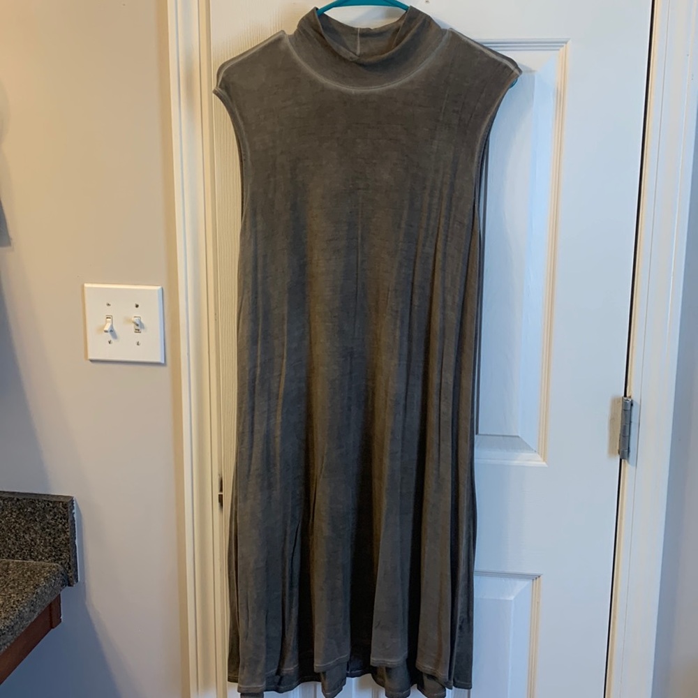 Large, tan turtleneck dress
